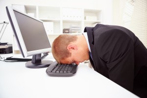bigstock_A_Tired_Businessman_With_His_F_5758089